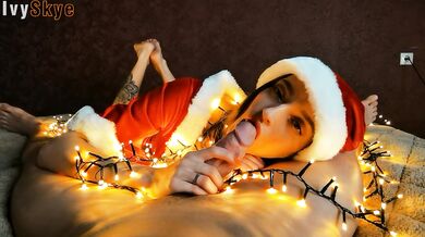 Christmas sexy santa gives a present: blowjob, footjob and cum on face