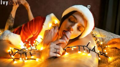 Christmas sexy santa gives a present: blowjob, footjob and cum on face