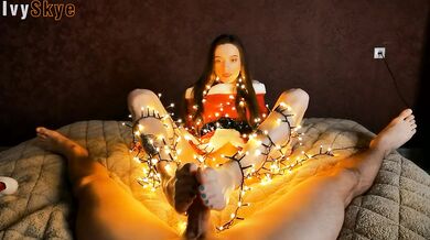 Christmas sexy santa gives a present: blowjob, footjob and cum on face