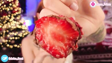 Enjoying strawberry in chocolate