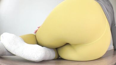 Close-Up Floor Peeing in Yoga Pants in Various Poses