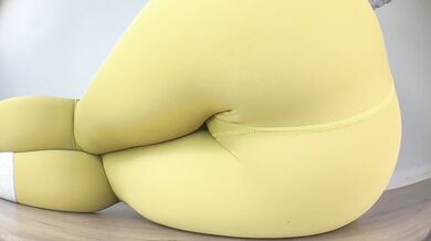 Close-Up Floor Peeing in Yoga Pants in Various Poses