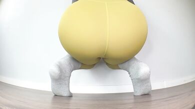 Close-Up Floor Peeing in Yoga Pants in Various Poses