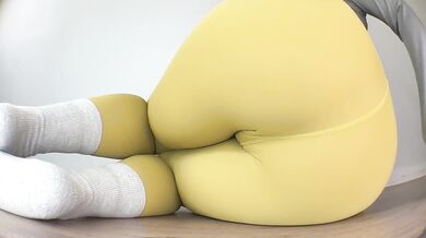 Close-Up Floor Peeing in Yoga Pants in Various Poses