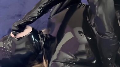 Fucking in a latex vagina mask and gas mask.