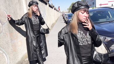 Miss Sandra Domina - Fetish walk and smoking with leather boots and leather leggings