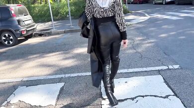 Miss Sandra Domina - Fetish walk and smoking with leather boots and leather leggings