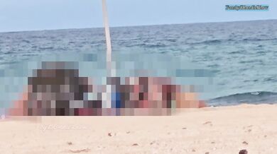 Extreme public sex on a nude beach with voyeurs