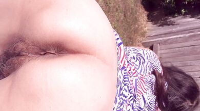 ASIAN MILF SPREADING HER WET SWEATY AND CREAMY PUSSY OUTDOORS IN THE PARK