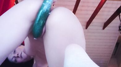 Norwegian girl squirting with a cucumber