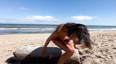126-A Asian milf plays on nude beach and oils white cock