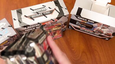 YouTuber opens football cards live, gets surprise facial