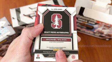 YouTuber opens football cards live, gets surprise facial