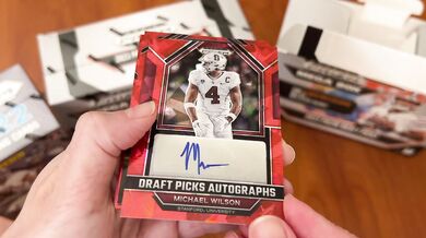 YouTuber opens football cards live, gets surprise facial