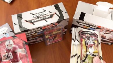 YouTuber opens football cards live, gets surprise facial