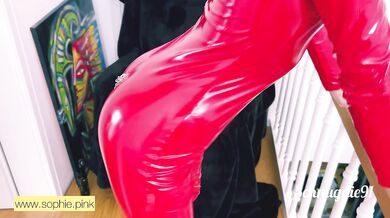Sweet blond girl in red latex catsuit is extremely horny