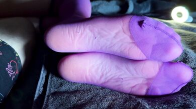 I jerk his cock and balls with my stockings, he rewards me with a cumshot on my soles!
