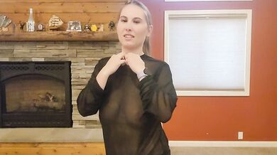 Trying on a see through black shirt