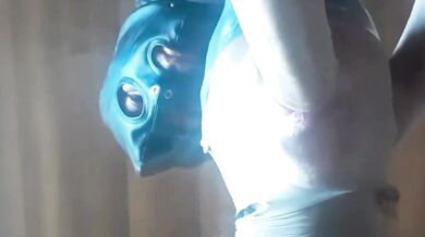 Second view of a milf Hooded in nylon, blindfolded with duct tape, facialized, and cummed in mouth