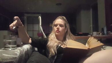 reading a book and smoking cigarette