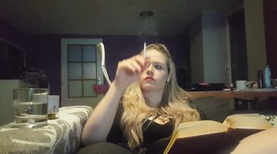 reading a book and smoking cigarette