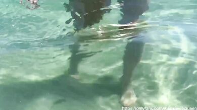Brunette with nice tits is causing voyeurs at the nude beach