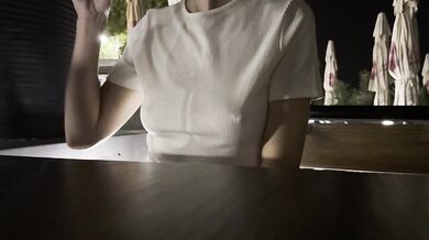 Hubby touches my pussy in a beach bar with me dressed in a tight shirt and short skirt, no panties.