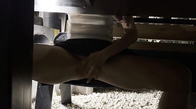 Hubby touches my pussy in a beach bar with me dressed in a tight shirt and short skirt, no panties.