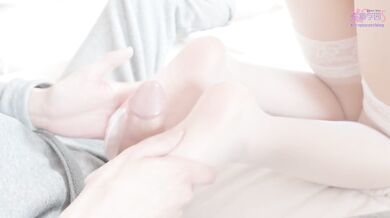 The girl put on a white swimsuit and white stockings and gave me a footjob and oral sex service