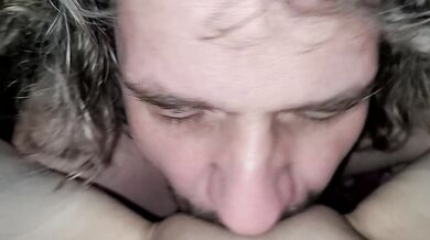 Daddy licks her girl with a toy in her pussy till she cums. She squirts in daddy's mouth