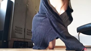 Naked under her woolen shawl, she teases you with her body