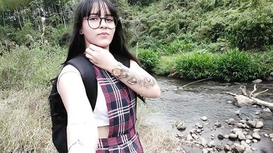 Beautiful schoolgirl is fucked in the public river.