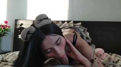 Cute slut with anal plug sucks my dick until cumming on her tits
