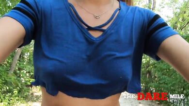 MILF bike ride flashing...loose shirt no bra.